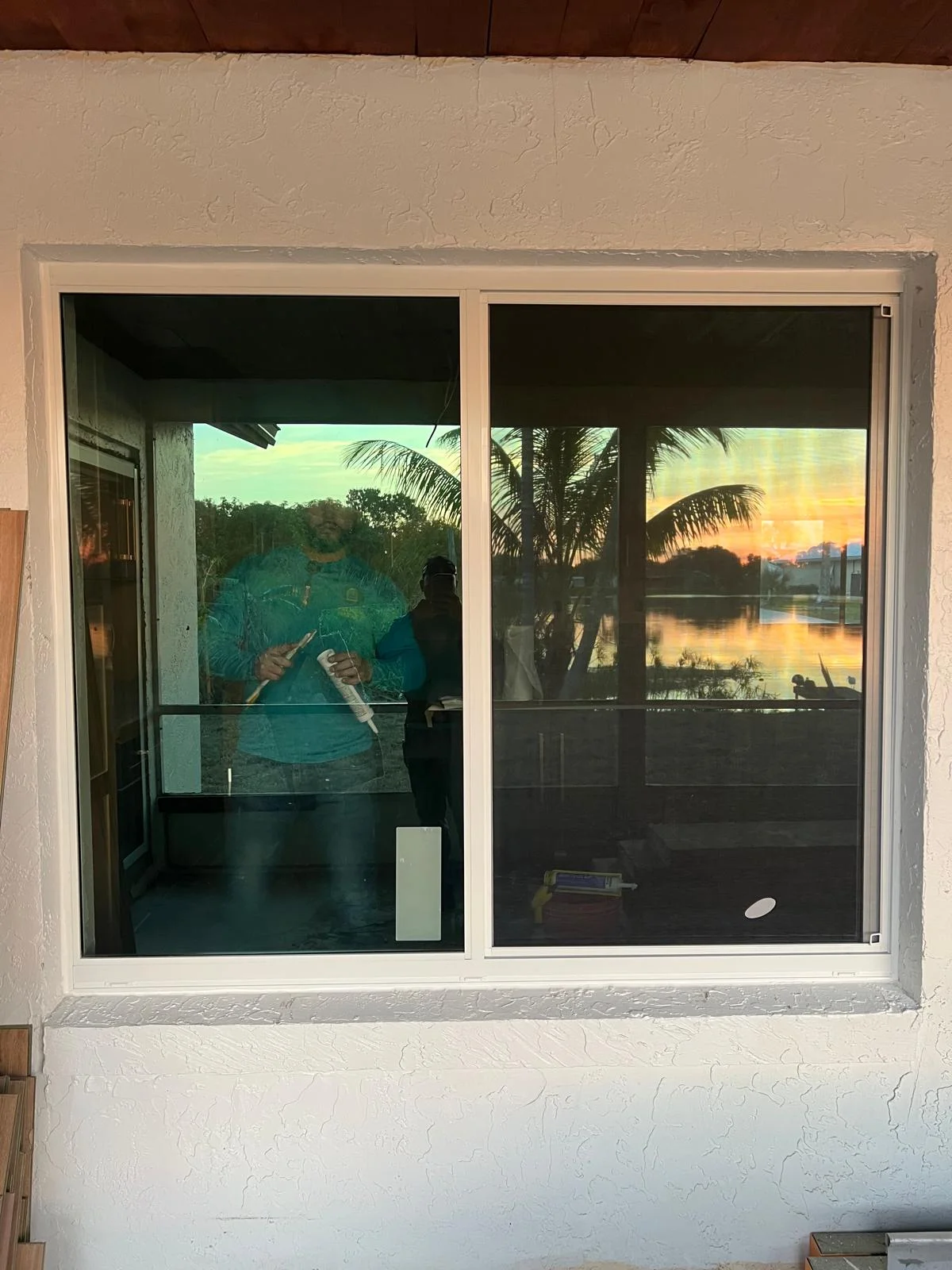 Sliding Window Sunset Reflection