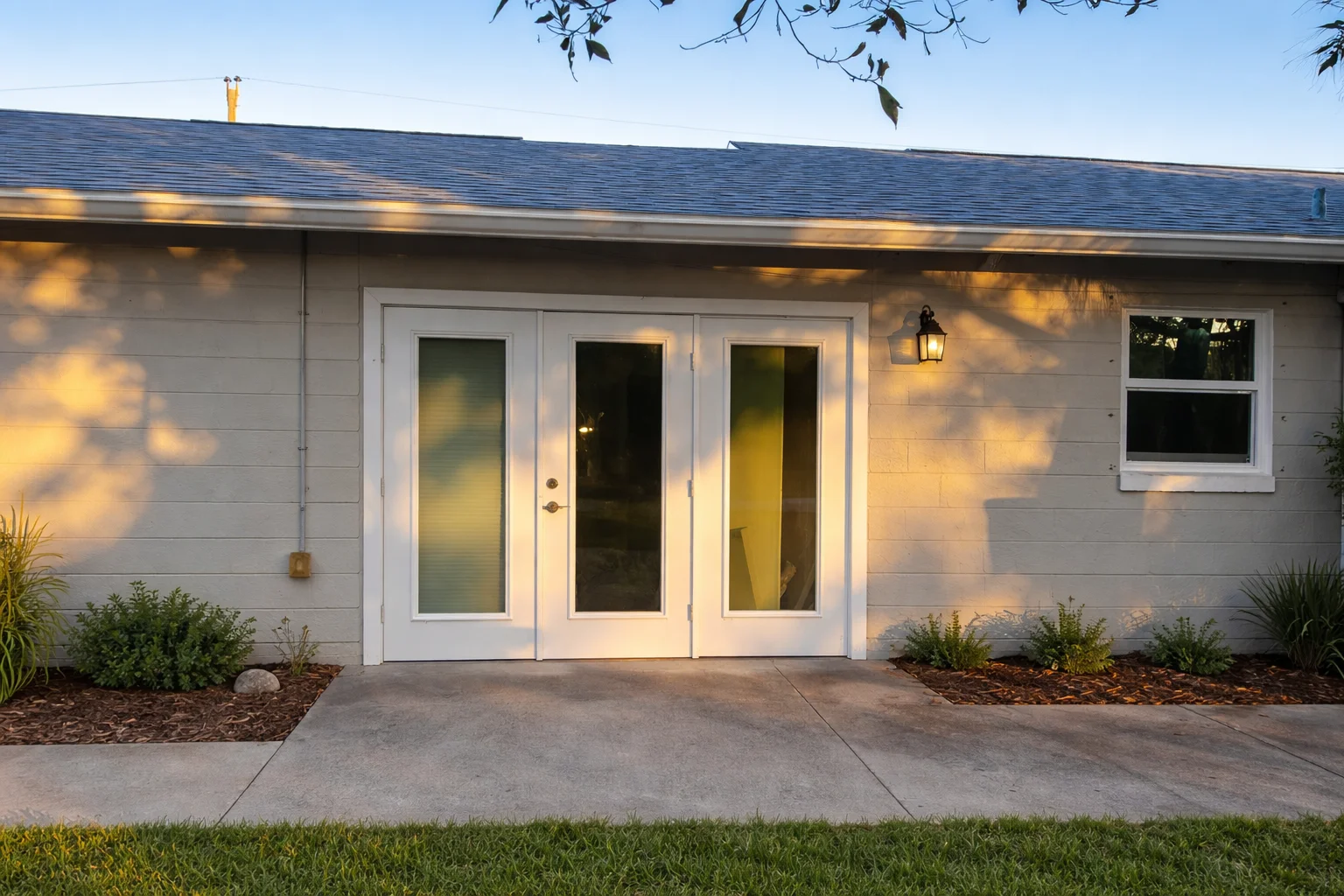 Serene Backyard View With French Doors