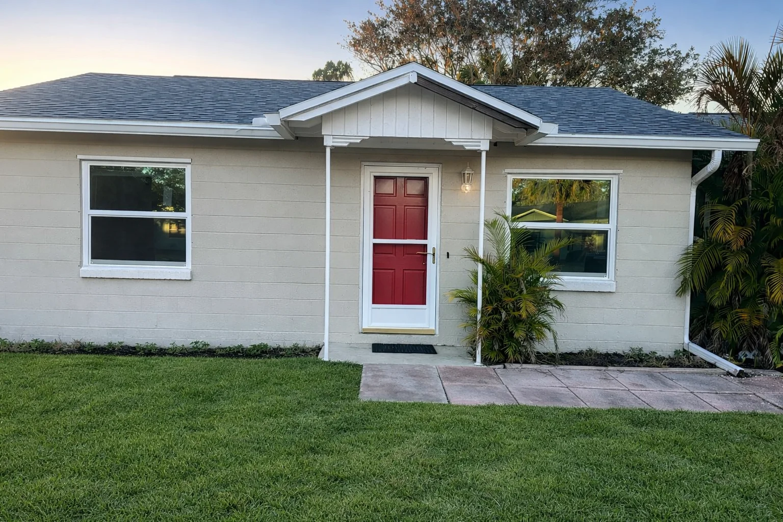 Suburban Home At Sunset